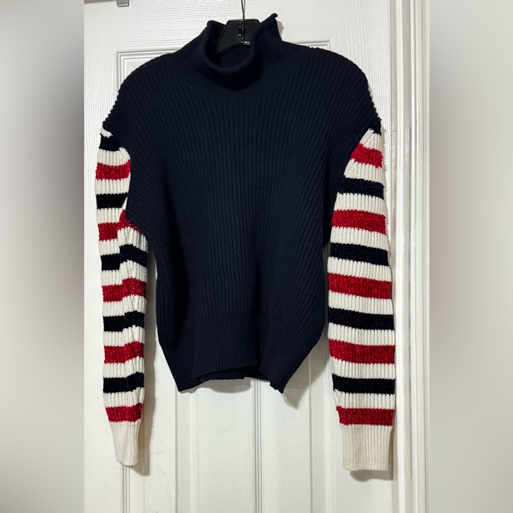 Rosie Assoulin Black Sweater with Red and White Striped Sleeves